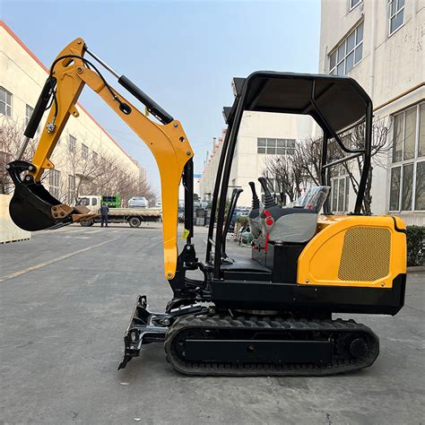 how steep can a mini excavator climb|mini excavator climbing slope.